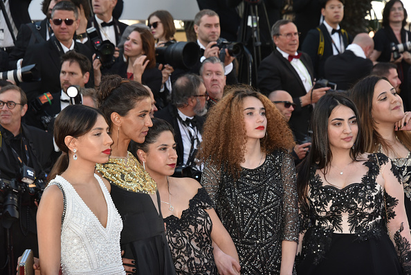 A general view of atmosphere with Emmanuelle Bercot, Eva Husson, Golshifteh Farahani and women Filmmakers on the steps of the red carpet in protest of the lack of female filmmakers honored throughout the history of the festival during the 'Girls Of The Sun (Les Filles Du Soleil)' Red Carpet Arrivals - The 71st annual Cannes Film Festival at the Palais des Festivals on May 12, 2018 in Cannes, France. Cannes 2018,Cannes Film Festival,Cannes film festival 2018,protest at Cannes,Cannes protest,Cannes protest pics,Cannes protest images