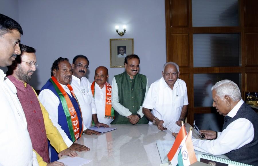Karnataka Governor Vajubhai Vala on Wednesday invited BJP legislative party leader B.S. Yeddyurappa to form the new government and to take oath as Chief Minister on Thursday, a party spokesman said. "We received a communique from the Raj Bhavan, inviting Yeddyurappa to form the government and take oath at 9.30 a.m.," BJP state unit spokesman Vamanacharya told IANS here. Only Yeddyurappa will take oath at a simple ceremony in the 'Glass House' on the lawns of the Raj Bhavan in the city centre amid tight security. Karnataka Governor Vajubhai Vala,Vajubhai Vala,B.S. Yeddyurappa,Yeddyurappa,Yeddyurappa as CM,Yeddyurappa take oath,Yeddyurappa Chief Minister