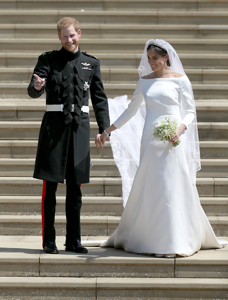 Prince Harry married US actress Meghan Markle in a ceremony at St. George's Chapel at Windsor Castle here on Saturday. Meghan became the first royal bride to walk herself up the aisle at a royal wedding. She was met half way by Prince Charles, the Duke of Cornwall, who walked her down the aisle of the Quire of the chapel. Her father Thomas Markle was unable to attend due to health issues. Among the 600 celebrity guests invited to the St. George Chapel were internationally acclaimed Indian actress Priyanka Chopra, Oprah Winfrey, George and Amal Clooney, David and Victoria Beckham, Elton John, Tom Hardy, James Corden, James Blunt and Carey Mulligan among others. Tennis star Serena Williams and rugby star Jonny Wilkinson were also present. Prince Harry and Meghan Markle,Prince Harry and Meghan Markle wedding,Prince Harry and Meghan Markle marriage,Prince Harry,Prince Harry wedding,Meghan Markle,Meghan Markle wedding,royal wedding pictures,royal wedding pics,royal wedding images