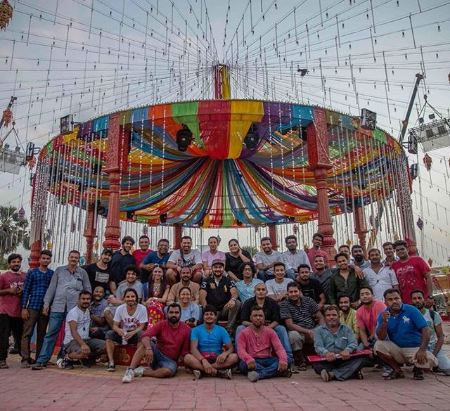 The entire BTS team of Salman Khan Films' upcoming romantic drama 'Loveratri' poses for a happy picture on the sets of the film. Shooting for the ongoing schedule of the film in Gujarat, team 'Loveratri' is having a great time filming the colourful film. Recently, the team wrapped the London schedule of the film. Earlier, Loveratri shot its first schedule in Gujarat that included rigorous Garba training. Aayush Sharma has time and again treated the audience with on set pictures giving glimpses into the film. The actors also underwent training sessions before commencing the shoot. The varied pictures and insights have generated immense curiosity amongst the audience to witness the film. Uploading the crew of the film, Arpita Khan Sharma posted a picture of the behind the camera team saying, "The people behind the scenes, Team Loveratri @abhiraj88 @aaysharma @warinahussain @skfilmsofficial #loveratri". Set against the backdrop of Gujrat, the romantic drama unfolds the love story of the leading couple over the span of Navratri. The romantic drama will present the fresh pairing of debutants Aayush Sharma and Warina Hussain. The poster and pictures from the film have already piqued the interest of the audience. Loveratri,Loveratri family,Loveratri on the sets,Salman Khan,Salman Khan films
