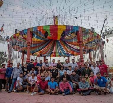 The entire BTS team of Salman Khan Films' upcoming romantic drama 'Loveratri' poses for a happy picture on the sets of the film. Shooting for the ongoing schedule of the film in Gujarat, team 'Loveratri' is having a great time filming the colourful film. Recently, the team wrapped the London schedule of the film. Earlier, Loveratri shot its first schedule in Gujarat that included rigorous Garba training. Aayush Sharma has time and again treated the audience with on set pictures giving glimpses into the film. The actors also underwent training sessions before commencing the shoot. The varied pictures and insights have generated immense curiosity amongst the audience to witness the film. Uploading the crew of the film, Arpita Khan Sharma posted a picture of the behind the camera team saying, 