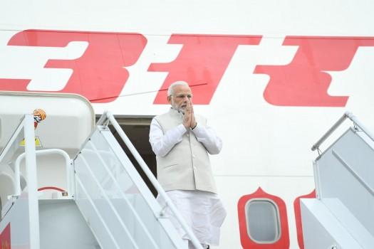 Indian Prime Minister Narendra Modi arrived here on Monday on a nine-hour visit during which he will hold an informal summit with Russian President Vladimir Putin. 