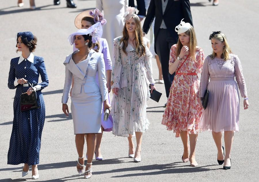 Abigail Spencer and Priyanka Chopra arrive at the wedding of Prince Harry to Ms Meghan Markle at St George's Chapel, Windsor Castle in Windsor, Britain, May 19, 2018. Priyanka Chopra,actress Priyanka Chopra,Meghan Markle and Prince Harry wedding,Meghan Markle wedding,Prince Harry wedding,Meghan Markle and Prince Harry marriage