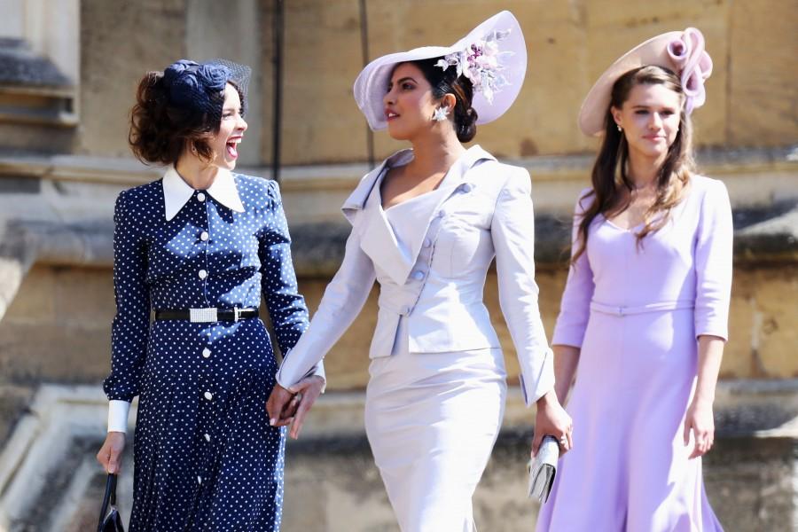 (L-R)Abigail Spencer and Priyanka Chopra arrive at the wedding of Prince Harry to Ms Meghan Markle at St George's Chapel, Windsor Castle on May 19, 2018 in Windsor, England. Priyanka Chopra,actress Priyanka Chopra,Meghan Markle and Prince Harry wedding,Meghan Markle wedding,Prince Harry wedding,Meghan Markle and Prince Harry marriage