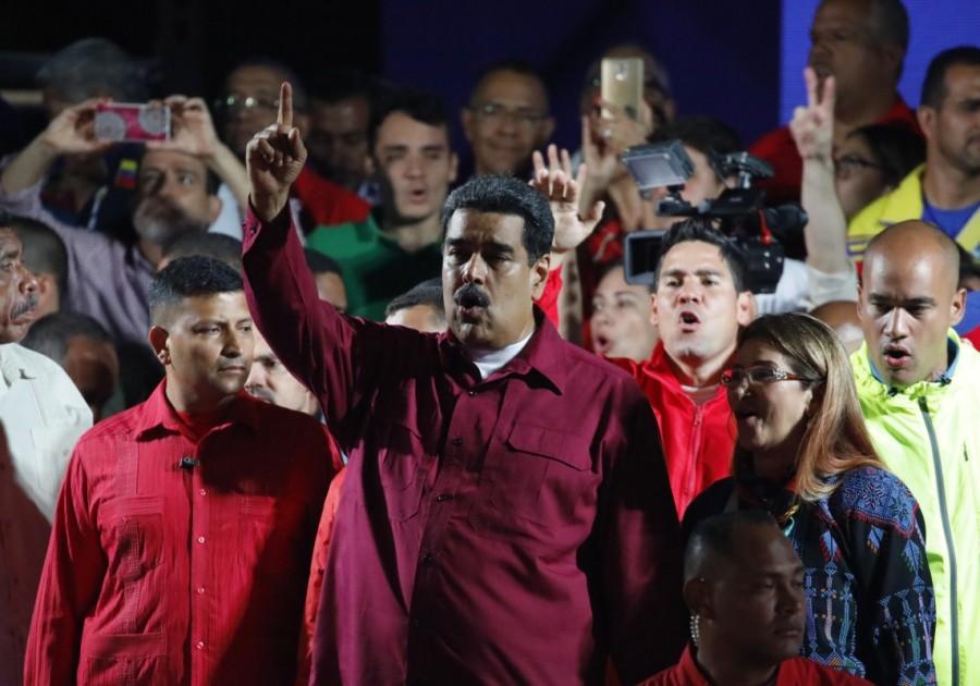 Venezuela's President Nicolas Maduro stands with supporters during a gathering after the results of the election were released, outside of the Miraflores Palace in Caracas, Venezuela, May 20, 2018. Nicolas Maduro,President Nicolas Maduro,Nicolas Maduro re-elected