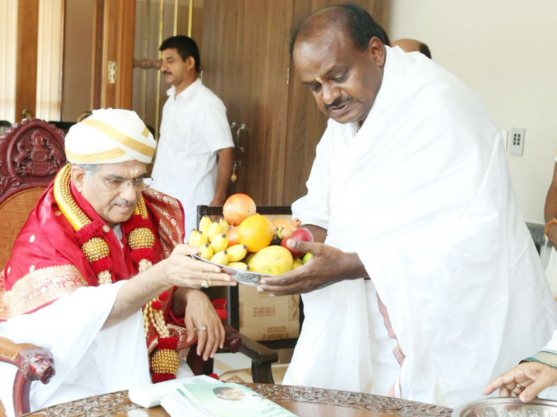 The JD-S leader has asked party cadres not to erect banners, flexi boards and burst crackers as they would harm the environment, a party official said. Kumaraswamy,hd kumaraswamy,Kumaraswamy at Dharmasthala,Kumaraswamy swearing-in,hd kumaraswamy swearing-in ceremony,Kumaraswamy seeks blessings