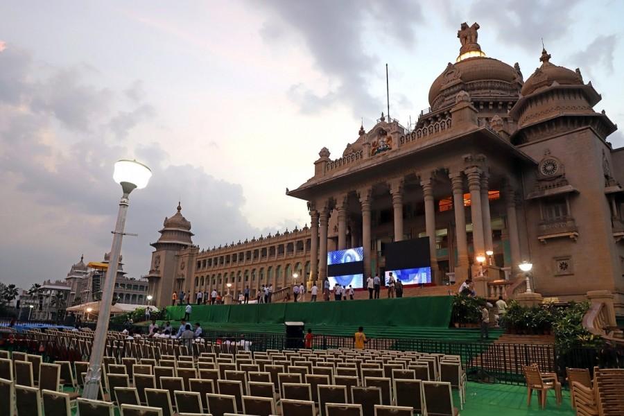 Preparations for swearing in ceremony of Karnataka Chief Minister-designate H. D. Kumaraswamy underway at Vidhan Soudha in Bengaluru. Governor Vajubjai Vala invited the 58-year-old JD-S legislative party leader on Saturday to form the coalition government after the fall of the three-day BJP government led by Chief Minister B.S. Yeddyurappa, who resigned even before the trust vote was conducted since his party was seven MLAs short of the halfway mark to prove simple majority in a house of 222 members. The Janata Dal-Secular (JD-S) leader HD Kumaraswamy will take oath at 4.30 p.m. on Wednesday in front of the Secretariat (Vidhan Soudha) in the presence of Sonia Gandhi, Rahul Gandhi, and Delhi and Kerala Chief Ministers Arvind Kejriwal and Pinarayi Vijayan respectively. Kumaraswamy,hd kumaraswamy,Kumaraswamy swearing in ceremony,Kumaraswamy swearing in ceremony pics,Kumaraswamy swearing in ceremony images,Vidhan Soudha