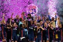 Lyon defeated Wolfsburg 4-1 here to win a third consecutive UEFA Women's Champions League title and their fifth overall, a new record for the competition. The 90 minutes of regulation time between the two powerhouses of women's club football in Europe -- this was the third time they played each other in the final -- offered little in the way of excitement on Thursday, reports Efe. Both of their previous meetings were tight. Wolfsburg won 1-0 in the 2013 final, while Lyon prevailed on penalties in 2016, so nobody was surprised when the match went into extra time. What was a pleasant surprise for the fans at Kiev's Valeriy Lobanovskyi Stadium was the ensuing offensive explosion. After emphasising defence in regulation, Wolfsburg shifted gears to take a 1-0 lead with Pernille Harder's goal in the 93rd. But the German side's euphoria was short-lived, as they found themselves down to 10 players after Alexandra Popp was sent off for a second yellow card. Amandine Henry equalised for Lyon in the 98th minute and the French club pulled ahead a minute later on a goal by Eugenie Le Sommer, assisted by late sub Shanice van de Sanden, who also contributed to Ada Hegerberg's strike in the 103rd minute to put the side up 3-1. Camille Abily, playing in her record 81st Champions League match, added a fourth goal in the 116th minute. Hegerberg also made history, setting a new mark for the most goals in a Women's Champions League campaign with 15 goals.