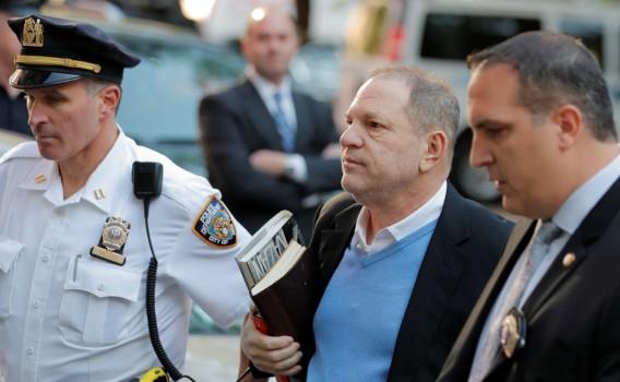 Hollywood film producer Harvey Weinstein, accused by over 80 women of sexual harassment, on Friday surrendered to police here to face charges of sexual misconduct more than seven months after the allegations first surfaced publicly. Weinstein, 66, turned himself into authorities at the first precinct in Manhattan on Friday. He was arrested shortly thereafter, the New York Police Department said. He is expected to be charged and brought on trial later on Friday, according to hollywoodreporter.com. The Oscar-winning producer landed in a twin expose in The New York Times and The New Yorker that was published in October and chronicled a pattern of alleged harassment and sexual assault of both actresses and employees at Weinstein's studios Miramax and its successor, The Weinstein Co. In no time, high-profile actresses like Ashley Judd, Rose McGowan, Mira Sorvino, Angelina Jolie and Gwyneth Paltrow came forward with claims against the producer. Weinstein, wearing a white button-down shirt and light-blue sweater under a black blazer and grey pants and carrying two books, entered the first precinct police station in Manhattan's Tribeca neighbourhood. He remained silent even though the reporters, photographers and TV news crews camped outside of the police department shouted questions at him, including 