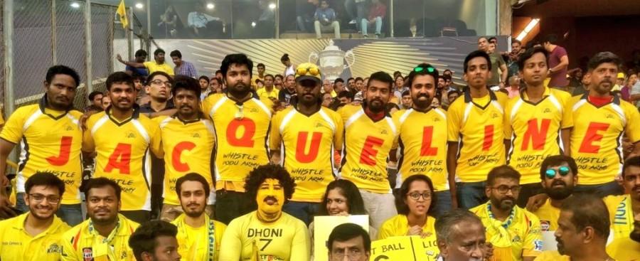 The official fan club of Chennai Super Kings, Whistle Podu did not only express their love for cricket team, but also rose in cheer for Bollywood actress Jacqueline Fernandez. IPL 2018 finale which saw Jacqueline Fernandez' grooving to two sensational songs garnered immense hooting and cheering from the audience. What grabs our attention is that, Jacqueline's fanbase is not just limited to moviegoers but also cricket fanatics. The champions of IPL 2018, Chennai Super Kings' official fanclub, Whistle Podu Army were in awe of Jacqueline Fernandez and expressed their love for the actress with a unique gesture. The members of this fanclub went ahead wearing T-shirts dedicated to Jacqueline, in addition to holding placards. Sharing the picture, Whistle Podu Army took to Twitter captioning, "Looks like the Whistlepoduarmy is enjoying the #YelloveFinals and there are lot of cheers and love for @Asli_Jacqueline in Wankhede". Chennai Super Kings,CSK,Jacqueline Fernandez,Race 3 actress,Race 3,Bollywood actress Jacqueline Fernandez,IPL 2018 Final