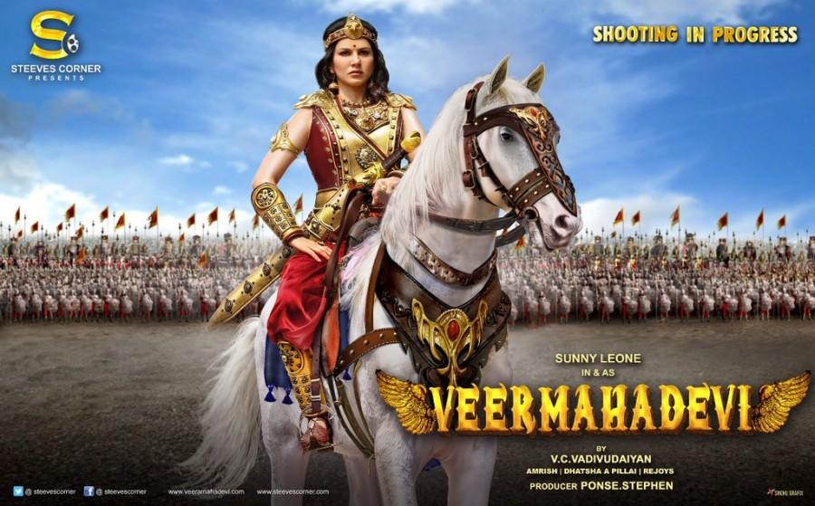 Veeramadevi first look: Sunny Leone looks majestic as a warrior queen. Actress Sunny Leone says that she did her own horse riding and other stunts for the first look shoot for her upcoming film "Veeramadevi". Sunny on Monday shared a video of herself riding a horse. She captioned it: "Practice ride with this beautiful animal before shooting 'Veeramadevi' did my own riding and stunts for this first look shoot!" "Veeramadevi", a period drama, will mark the debut of the Indo-Canadian actress in the Tamil film industry. It is being produced by Ponse Stephen under the banner Steves Corner. "Veeramadevi" is helmed by VC Vadivudaiyan and stars Navdeep Pallapolu as the antagonist. Veeramadevi first look,Veeramadevi,Veeramadevi poster,Veeramadevi first look poster,Sunny Leone,Sunny Leone as warrior queen,Karenjit Kaur Vohra,Sunny Leone pics,Sunny Leone images,Sunny Leone stills