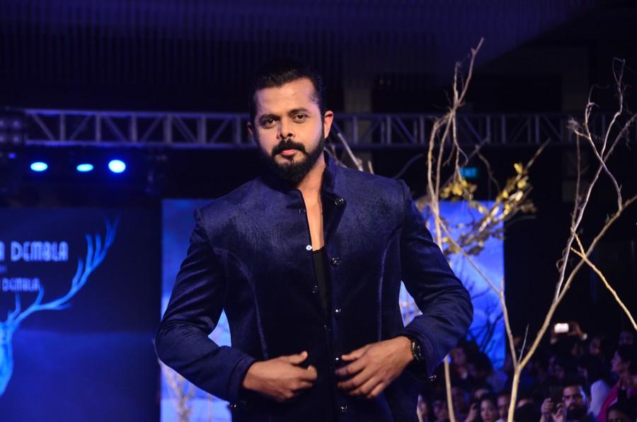 Former Indian cricketer S Sreesanth who will be soon seen in Kannada movies, walked the ramp for city-based designer Ramesh Dembla for his latest collection - The Moody Blues, ace designer took on the coolest colour of the rainbow and infused it for an all-inclusive line of Indo-Western formals, ranging from dresses and gowns to lehengas and anarkalis. Kannada stars J Karthik and Shubhra Aiyappa kept the spirit of Bengaluru alive on the runway. Cricketer Sreesanth,Sreesanth,Kirti Kharbanda,Harshika Poonacha,Bangalore Times Fashion Week 2018,Bangalore Times Fashion Week,Bangalore Times Fashion Week 2018 pics,Bangalore Times Fashion Week 2018 images