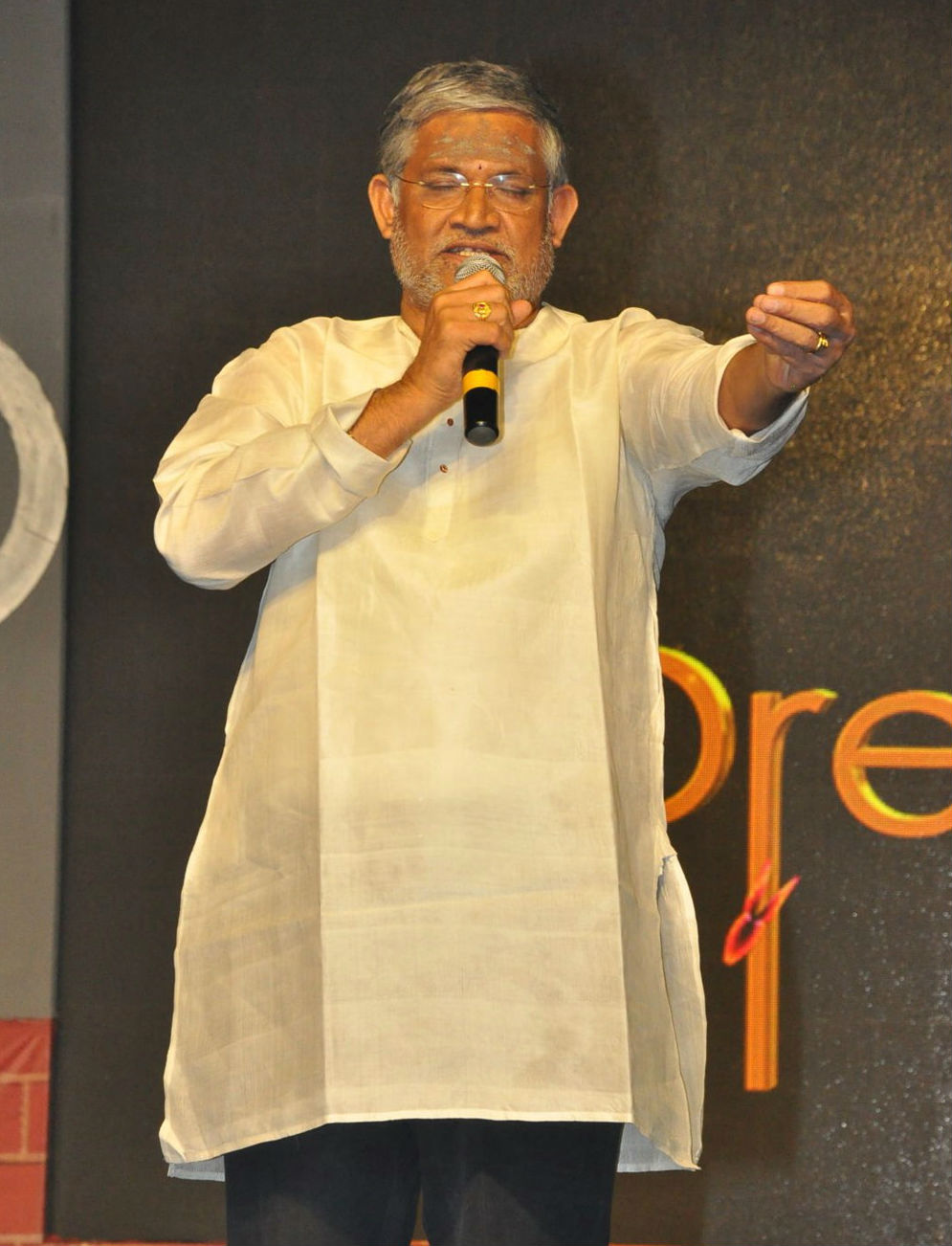 Tanikella Bharani interacts with media during Officer pre-release event. Akkineni Nagarjuna,Myra Sareen,Amala Akkineni,Naga Chaitanya,Akhil Akkineni,MM Keeravani,Ram Gopal Varma,Officer,Officer pre-release event,Officer pre-release event pics,Officer pre-release event images