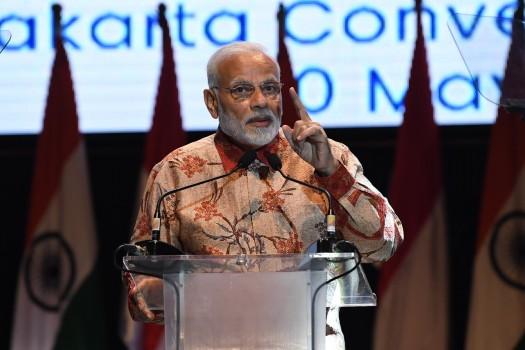 Prime Minister Narendra Modi addresses the Indian Diaspora at a community event in Indonesia. Showcasing India's achievements over the last few years, Prime Minister Narendra Modi on Wednesday addressed the Indian diaspora in Jakarta in Indonesia and hailed the historic relations between the two countries. Hailing how the Indian diaspora, while being proud citizens of Indonesia, remained connected to their Indian roots, Modi said they should take pride in the way India had progressed in the recent past. He said that India in the last four years had positively contributed to the global economy and had emerged as one of the most open economies in the world. 