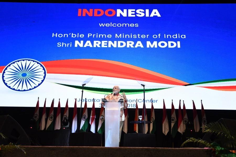 The Prime Minister said that India had jumped 19 places in the Logistics Performance Index and 21 places in the Global Innovation Index. "In the last 14 years, it is for the first time that Moody's have increased India's credit rating," he said. Modi added that his government was working at a much faster pace compared to the previous governments and it was its topmost priority to provide a "corruption-free, citizen-centric and development-friendly ecosystem" to the country. The Prime Minister said that India and Indonesia shared a historic relationship and just like India, Indonesia had strong foundations of democracy. "India and Indonesia are symbols of social and cultural diversity and harmony. There is a special link between their cultures. "Both countries are proud of their democratic ethos and their diversity. In 2014, people of India voted for a government headed by a person belonging to a poor background. Similarly, the people of Indonesia elected President Joko Widodo whose background is also humble," he said. PM Narendra Modi,Narendra Modi,Narendra Modi at Indonesia,Indian Diaspora,Indian Diaspora event