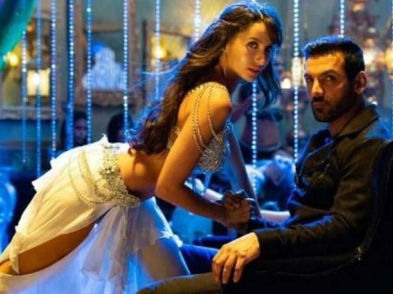 Nora Fatehi has currently been in the news for her upcoming dance number with John Abraham in the Nikhil Advani film, Satyamev Jayate. The announcement has gotten everyone keen to see what the beauty comes up with, especially since it is inspired by Sushmita Sen’s famous 90's song "Dilbar" from the film Sirf Tum. Apart from having big shoes to fill, Nora has also taken major inspiration for her clothes and moves in the video from internationally renowned Turkish belly dancer, Didem. The Turkish star is well known for her outfits and Nora wanted her costumes in the song to use some of those styles and cuts. In belly dancing it is crucial to have the right outfit especially those that give the dancer the freedom to glide through the floor. Not just the outfit, but Nora even channelised moves from the iconic figure in the dancing world and took inspirational cues from her while shaking a leg to the song. Nora is herself known for her belly dancing videos which she uploads on her social media earning her a great number of fan following. Nora Fatehi,actress Nora Fatehi,John Abraham,actor John Abraham,Nora Fatehi and John Abraham,Satyamev Jayate,Nikhil Advani