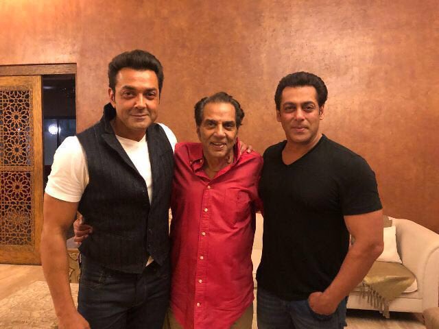 Superstar Salman Khan, who is gearing up for his Eid release, posed with veteran actor Dharmendra and his son and co-stor Bobby Deol, as he hilariously added a "Race 3" meme zinger to the photograph. "Our Dharmji is our Dharmji! Chalo in this special case your Dharamji, too," Salman on Friday tweeted the photograph with the yesteryear star. His caption is inspired by actress Daisy Shah’s line "Our business is our business…" from the film. The third instalment of the action blockbuster “Race” franchise, also stars Jacqueline Fernandez, Anil Kapoor, Saqib Saleem and Freddy Daruwala. The film is directed by Remo D’Souza, produced by Salman Khan Films and Tips Films and will release on June 15. Salman Khan,actor Salman Khan,Salman Khan with Dharmendra,Dharmendra,Bobby Deol,Salman Khan with Bobby Deol,Race 3,Race 3 movie,Race 3 review