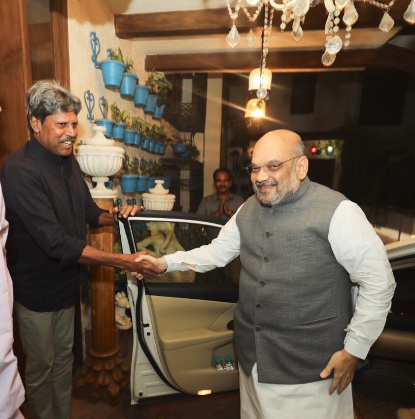 Modi, as part of the campaign, also addressed beneficiaries of the Ujjwala Yojana and Mudra Yojana on Monday and Tuesday, respectively, through the NaMo app. BJP President Amit Shah,Amit Shah,Amit Shah meets Kapil Dev,Kapil Dev,former Indian cricket team captain Kapil Dev,Sampark Se Samarthan,BJP