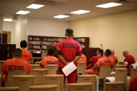 Detainees attend a service in a chapel at Otay Mesa immigration detention center in San Diego, California, U.S.
