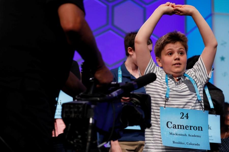 Cameron Keith stretches between rounds of the Scripps National Spelling Bee at National Harbor in Oxon Hill, Maryland, U.S., May 31, 2018. Karthik Nemmani,Karthik Nemmani wins National Spelling Bee,National Spelling Bee,Indian-American,National Spelling Bee winner,Scripps national spelling bee,Koinonia