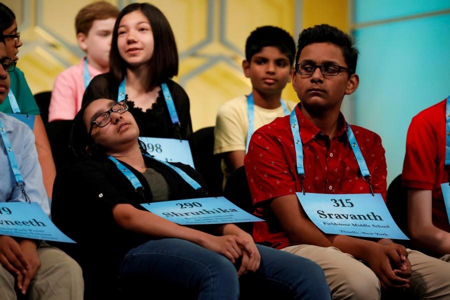 Shruthika Padhy relaxes between rounds during the Scripps National Spelling Bee at National Harbor in Oxon Hill, Maryland, U.S., May 31, 2018. Karthik Nemmani,Karthik Nemmani wins National Spelling Bee,National Spelling Bee,Indian-American,National Spelling Bee winner,Scripps national spelling bee,Koinonia