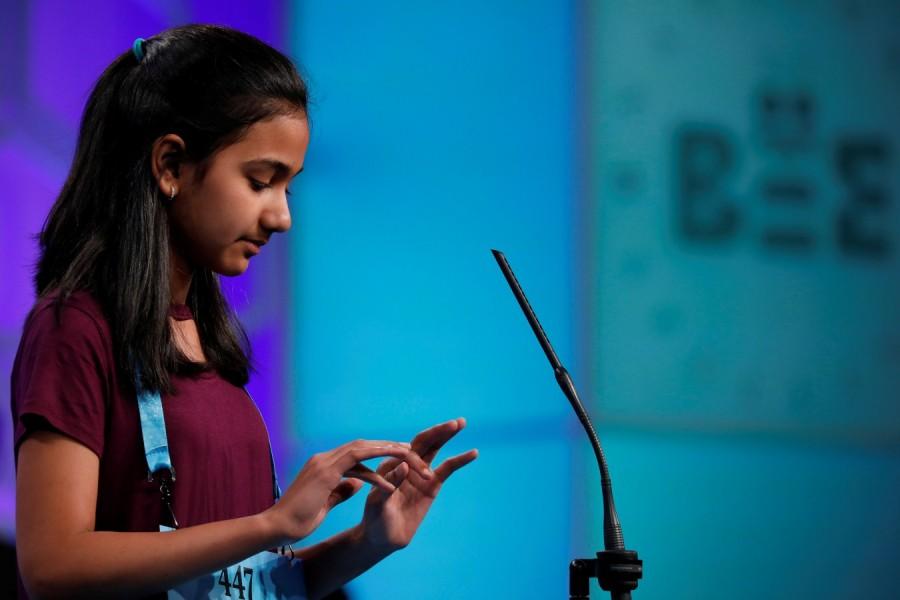 Naysa Modi spells a word during the Scripps National Spelling Bee at National Harbor in Oxon Hill, Maryland, U.S., May 31, 2018. Karthik Nemmani,Karthik Nemmani wins National Spelling Bee,National Spelling Bee,Indian-American,National Spelling Bee winner,Scripps national spelling bee,Koinonia
