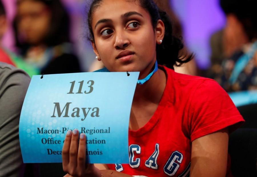 Maya Jyothinagaram of Forsyth, Illinois, watches fellow contestants during the Scripps National Spelling Bee at National Harbor in Maryland, U.S. May 30, 2018. Karthik Nemmani,Karthik Nemmani wins National Spelling Bee,National Spelling Bee,Indian-American,National Spelling Bee winner,Scripps national spelling bee,Koinonia