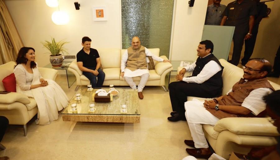 Bhartiya Janata Party president Amit Shah meets actress Madhuri Dixit as part of Sampark for Samarthan campaign. Amit Shah,BJP President Amit Shah,Amit shah bjp,president Amit Shah,Amit Shah meets Madhuri Dixit,Madhuri Dixit,Sampark for Samarthan