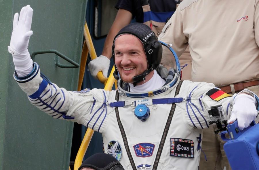 International Space Station (ISS) crew member Alexander Gerst of Germany waves as he boards the Soyuz MS-09 spacecraft for the launch at the Baikonur Cosmodrome, Kazakhstan June 6, 2018. Russian Soyuz capsule,Russian Soyuz rocket,Soyuz rocket,Soyuz MS-09,MS-09 spacecraft,Alexander Gerst,Soyuz blasts off