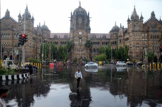Heavy rain accompanied by thunder and lightning lashed Maharashtra's Mumbai city on Monday night, causing water-logging and disruption of local train services. Water-logging has been reported in several areas including Malabar Hill and Hindmata, Dharavi, Byculla, Dadar TT, Kabutarkhana at Dadar, King Circle, Nagpada, Santacruz (East) and Marol Maroshi.