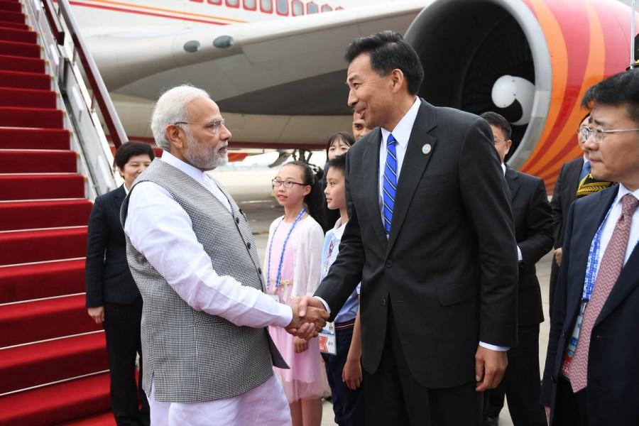"SCO focusses on political, economic, security and cultural cooperation and enables India to engage with Central Asian countries," External Affairs Ministry spokesperson Raveesh Kumar tweeted as Modi departed. PM Narendra Modi,Narendra Modi,Narendra Modi in China,Modi in China,SCO Summit,Modi at SCO Summit,SCO Summit pics,SCO Summit images
