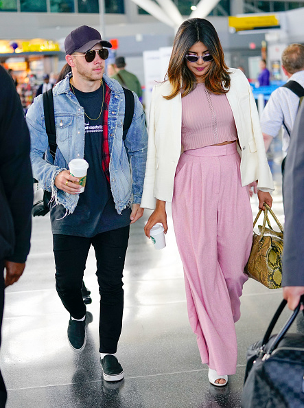 Nick Jonas and Priyanka Chopra at JFK airport on June 8, 2018 in New York City. Priyanka Chopra,Priyanka Chopra and Nick Jonas,Nick Jonas,Nick Jonas with Priyanka Chopra,Priyanka Chopra at JFK airport,JFK airport,celebs at JFK airport