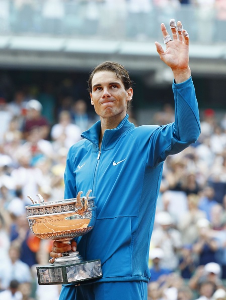 Rafael Nadal of Spain powered past Austrian Dominic Thiem in straight sets to clinch his record-extending 11th men's singles title at the French Open tennis championships here on Sunday. Following his 6-4, 6-3, 6-2 victory, Nadal became the second player in history to have won 11 singles titles at any Grand Slam event after Margaret Court, who won 11 Australian Open titles, reported Xinhua news agency. He also became the first player in the Open Era to have won 11 titles at three different Tour-level events, as he had done at ATP Monte-Carlo Masters and Barcelona Open. Nadal, who led 6-3 in previous head-to-heads, broke Thiem's service in the second game, before the Austrian had his own response to tie at 2-all through a break. Thiem was the only player to have defeated Nadal on clay prior to Roland Garros for the second straight year, and his quarterfinal victory over Nadal at the Madrid Masters snapped the Spaniard's 50-set winning streak on clay. He displayed his lethal weapon of single-handed backhand, while being troubled by unfavorable performance on his first serves, conceding the first set 6-4. Thiem already suffered four double faults despite four aces at the start of the second set, while Nadal maintained all of his serves in the second set to move a step further at 6-3. Thiem save three break points to hold his service into the third set, but the "King of Clay" responded by fully exhibiting his powerful forehand for astute winners. Rafael Nadal,Rafael Nadal 11th French Open title,Dominic Thiem,French Open tennis championships