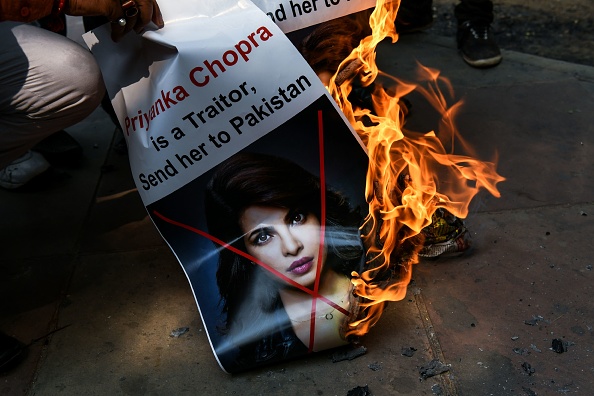 Social media users have been trolling Chopra, saying she had betrayed the country and her fans through her act, since the episode was aired on June 1. Priyanka Chopra,actress Priyanka Chopra,Priyanka Chopra Quantico,Quantico,Priyanka Chopra Quantico row,Priyanka Chopra posters torched