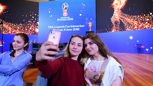 From September 2017 until its arrival in the stadium, the trophy visited more than 50 countries, covering nearly 150,000 kilometres (93,206 miles). FIFA World Cup,FIFA World Cup 2018,FIFA Legends Fan,FIFA Fans,Fans take selfies,Fans take selfies with FIFA World Cup,FIFA World Cup pics,FIFA World Cup images,FIFA World Cup stills,FIFA World Cup pictures