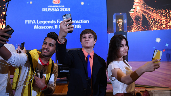 Fans take selfies with the FIFA World Cup trophy ahead of a FIFA Legends Fan Interaction Event at the Moscow University Lbrary on June 11, 2018. FIFA World Cup,FIFA World Cup 2018,FIFA Legends Fan,FIFA Fans,Fans take selfies,Fans take selfies with FIFA World Cup,FIFA World Cup pics,FIFA World Cup images,FIFA World Cup stills,FIFA World Cup pictures