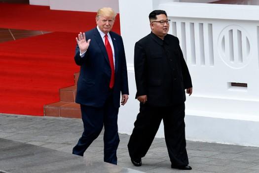 North Korean leader Kim Jong-un and US President Donald Trump on Tuesday took a walk around the Capella Hotel where the two leaders came face to face for the first time in history. In a carefully choreographed encounter at around 9 a.m., Trump and Kim shared a 12-second handshake in the courtyard of the British-colonial style hotel against a backdrop of American and North Korean flags. This was followed by a one-on-one meeting, an expanded bilateral meeting and a working lunch. After their walk, Trump showed off his car - nicknamed 'The Beast' - to Kim, reports The Straits Times. Kim and Trump will also sign a joint declaration that might put out a framework for additional talks, reports The Washington Post. Asked how the discussion went, Trump said: 