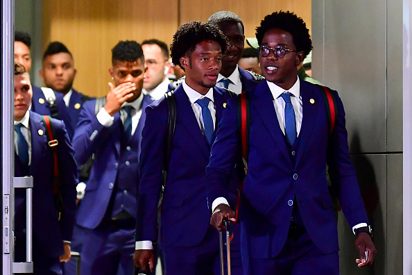 Colombian midfielder Carlos Sanchez (R) and midfielder Juan Cuadrado walk toward a bus as Colombia's national football team arrives at Kazan airport, on June 12, 2018 ahead of the Russia 2018 World Cup. 2018 FIFA World Cup,FIFA World Cup,FIFA World Cup 2018,Colombian team,Colombian team in Russia,Colombian football team