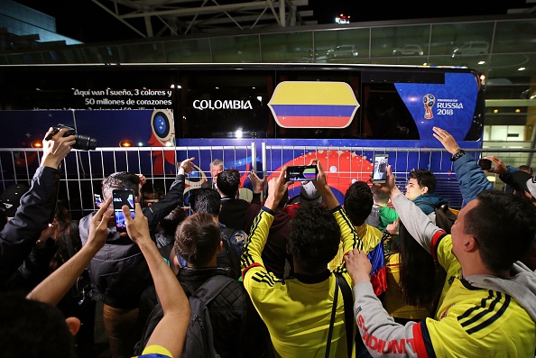Supporters cheer as the team bus with Colombia's national football team leaves upon arrival at Kazan airport, on June 12, 2018 ahead of the FIFA World Cup 2018. 2018 FIFA World Cup,FIFA World Cup,FIFA World Cup 2018,Colombian team,Colombian team in Russia,Colombian football team