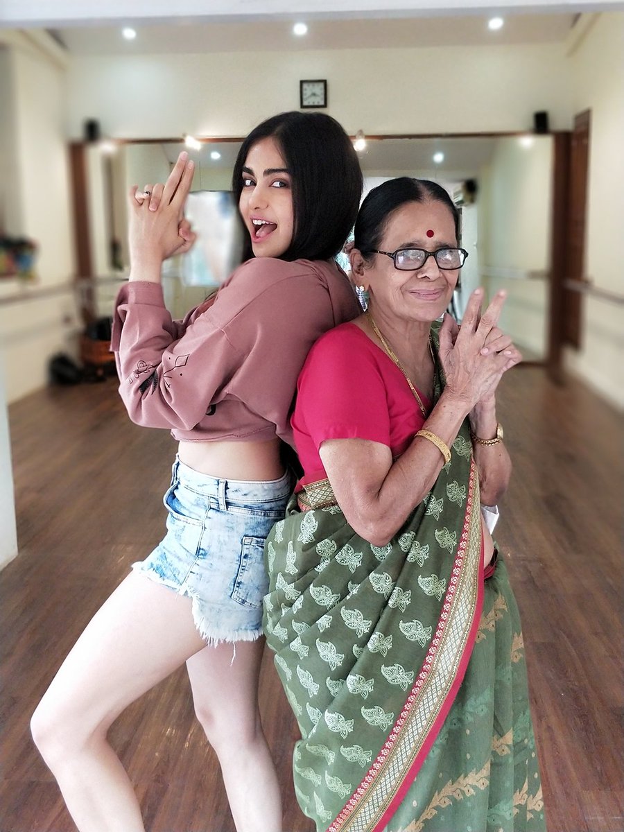 Bollywood actress Adah Sharma dancing with her grandmother for 'Bom Diggy' hit song is the cutest thing you'll see today. The actress posted an adorable video on her social media and shared a video on Instagram with the caption: "My granny (who is very tech savvy) sent me this ! Soooo sweetly written ... thank u @StoryPick and @midnightblues02" and "“TAG UR DANCE PARTNER MINE IS MY GRANDMOTHER @TULSISUNDAR MY SUNDAY INSPIRATION, THE POSITIVESTTTTESTT PERSON IN MY LIFE, MOST SPORTING, NON-CRIBBER, NONLAZY,, JUST SOOOOOOOOOO HARDWORKING ! AND NOW MY DANCE TEACHER TOO". Adah Sharma,Adah Sharma with her grandmother,Adah Sharma dancing with her grandmother,Adah Sharma dancing with grandmother,Adah Sharma dance