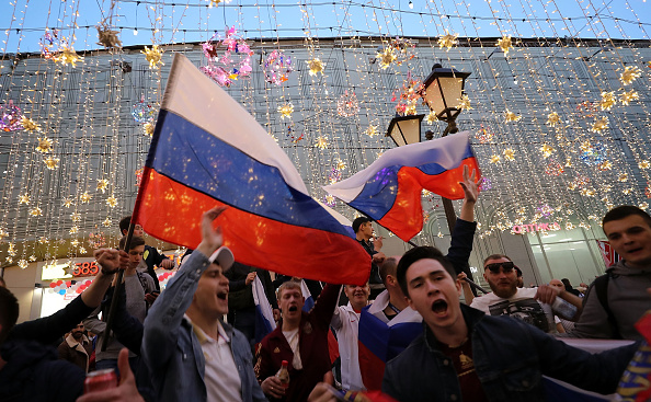 Football fans from Russian gather near Red Square ahead of the World Cup on June 13, 2018 in Moscow, Russia. Football fans,Football fans in Russia,Russia,World Cup kick-off,FIFA World Cup 2018,World Cup,FIFA World Cup opening,Ronaldo Fifa World Cup opening ceremony