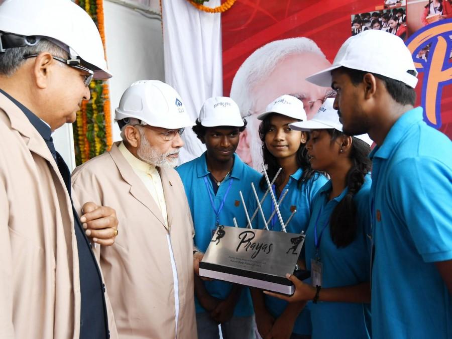 Prime Minister Narendra Modi on Thursday inaugurated the modernised extension of Chhattisgarh's Bhilai Steel Plant. The Prime Minister held a roadshow in Bhilai prior to his visit to the Steel Plant, while he also inaugurated the Integrated Command and Control Centre in Naya Raipur. According to an official release, "The modernization includes installation of cutting-edge technologies for improvement in productivity, yield, quality, cost competitiveness, energy efficiency and environmental protection." He is also slated to lay the foundation stone for the permanent campus of Indian Institue of Technology (IIT) Bhilai. PM Narendra Modi,Narendra Modi,Bhilai Steel Plant,Modi inaugurates Bhilai Steel Plant,Bhilai Steel Plant in Chhattisgarh,Modi in Chhattisgarh,Bhilai Steel Plant extension