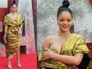 Singer Rihanna flaunts her curves at Ocean's 8 premiere in London's Leicester Square for the debut movie. The SOS singer snapped in a golden metallic outfit with an off-the-bear design that displayed her intricate tattoos.