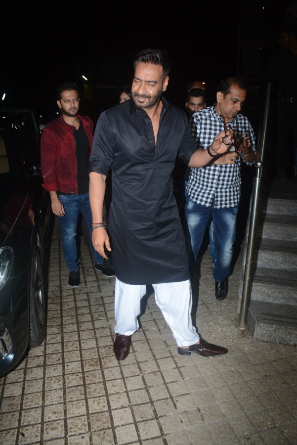 Ajay Devgn gets clicked on his arrival during Race 3 special screening in Mumbai. Ajay Devgn,Sonakshi Sinha,Tabu,Iulia Vantur,Salman Khan,Race 3,Race 3 special screening,celebs at Race 3 special screening,Race 3 special screening pics,Race 3 special screening images,Race 3 special screening stills,Race 3 special screening pictures