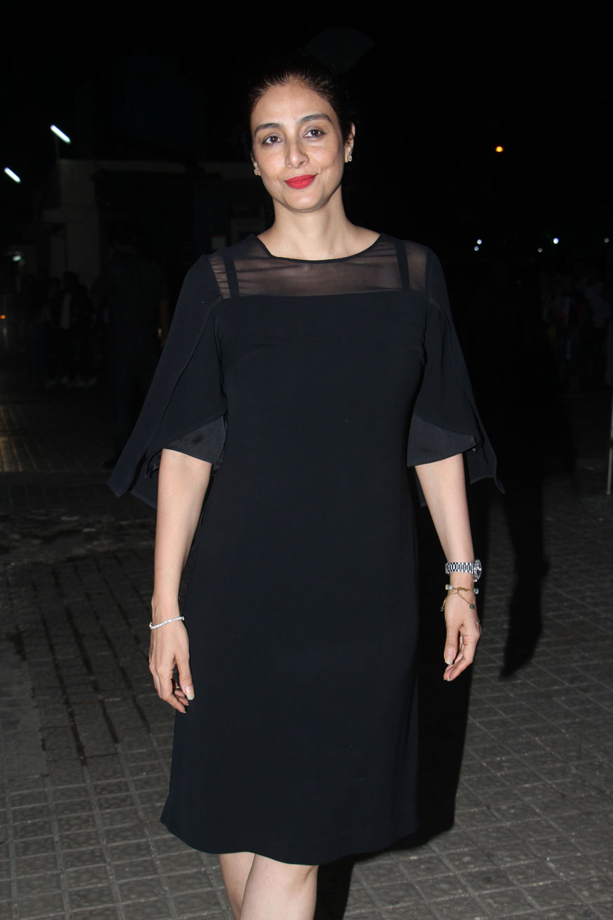 Tabu gestures for the cameras on her arrival during Race 3 special screening in Mumbai. Ajay Devgn,Sonakshi Sinha,Tabu,Iulia Vantur,Salman Khan,Race 3,Race 3 special screening,celebs at Race 3 special screening,Race 3 special screening pics,Race 3 special screening images,Race 3 special screening stills,Race 3 special screening pictures
