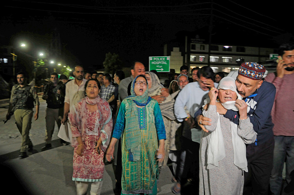 Hundreds of mourners attended the funeral of senior journalist and Editor-in-Chief of English daily "Rising Kashmir" Shujat Bhukhari in his ancestral hometown of Kheeri in Baramulla district. Former Chief Minister Omar Abdullah, state Public Works Minister Naeem Akhtar, senior Congress leader Saifuddin Soz, local journalists and other members from all sections of the society attened the funeral. Rising Kashmir,rising kashmir shujat bhukari,Rising Kashmir editor killed,Shujaat Bhukhari,Shujaat Bhukhari funeral,Shujaat Bhukhari funeral pics,Shujaat Bhukhari funeral images,Shujaat Bhukhari dead,Shujaat Bhukhari killed