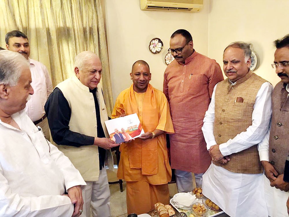 Uttar Pradesh Chief Minister Yogi Adityanath met eminent cardiologist Mansoor Hasan in Lucknow as a part of Bharatiya Janata Party's (BJP) 'Sampark se Samarthan' (Contact for Support) initiative. Hasan is known for helping establish the Lari Cardiology Centre at King George's Medical University (KGMU), Lucknow. Even after retiring from his services at KGMU, Hasan continued to be involved in clinical cardiology, besides having a keen interest to be updated with the recent advances occurring in this field. In 2011, Hasan was awarded the Padma Shri for his contribution in the development of cardiology. Sampark se Samarthan,Chief Minister Yogi Adityanath,CM Yogi Adityanath,cardiologist Mansoor Hasan,Mansoor Hasan,Bharatiya Janata Party,BJP