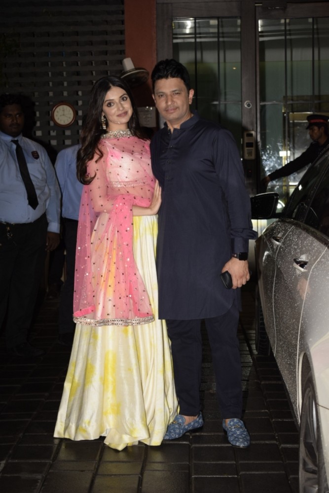Bhushan Kumar and Divya Khosla Kumar attended Salman Khan's Eid party on the weekend. Producer Bhushan Kumar who will be collaborating with Salman for Bharat was seen making a stylish entry at the star-studded party. They both kept it traditional, Bhushan Kumar wore a Purple kurta with Black salwar while his lady love Divya Kumar Khosla wore a floral print lehenga. The power couple always make headlines for their stylish spotting just as their movies does. Bhushan Kumar's T-Series has been enjoying a golden run at the box office with back to back successes in the last two years. Out of the four films minting over 100 crores this quarter, the producer has two films to his credit with 'Sonu Ke Titu Ki Sweety' and 'Raid'. Bhushan Kumar and Diya Khosla,Bhushan Kumar,Diya Khosla,Salman Khan,race 3,Salman Khan EID Party,Salman Khan EID Party pics,Salman Khan EID Party images,Salman Khan EID Party stills,Salman Khan EID Party pictures