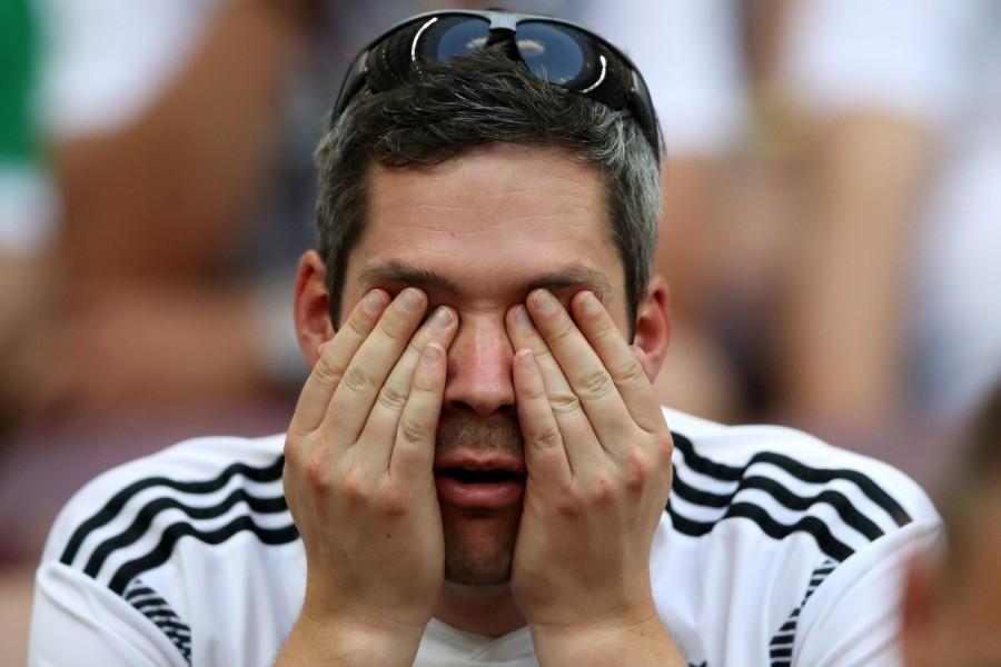 Germany fan looks dejected after the match. FIFA World Cup 2018,FIFA World Cup,2018 FIFA World Cup,Germany fans,germany football team,Germany and Mexico,Mexico