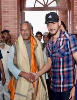 Superstar Mahesh Babu who is currently in Uttrakhand took time from his schedule and met the CM Trivendra Singh Rawat. Mahesh, who is in Uttrakhand to shoot for his 25th film met the CM and posed for a picture. The actor is all set to commence the 1st schedule of the 25th film in Uttrakhand. Superstar Mahesh Babu's last outing Bharat Ane Nenu has been a blockbuster. Bharat Ane Nenu released on April 20th and won accolades from all the classes.